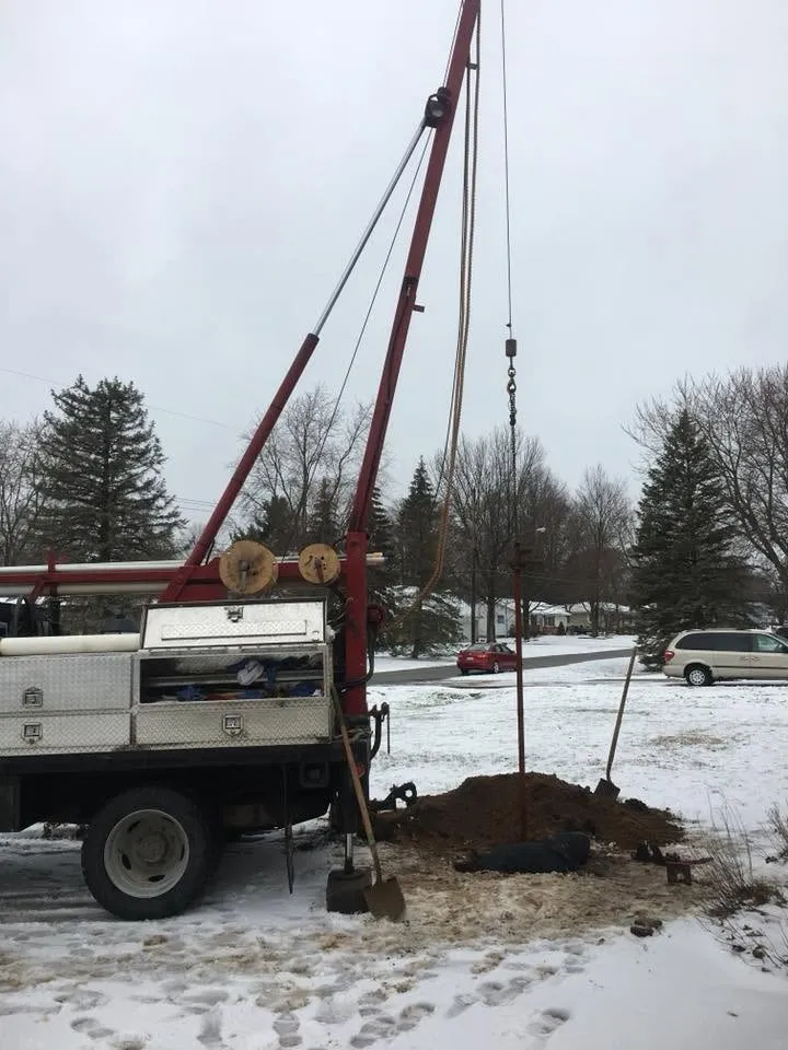 Wahlfield truck-mounted rig drilling close in on a residential property.