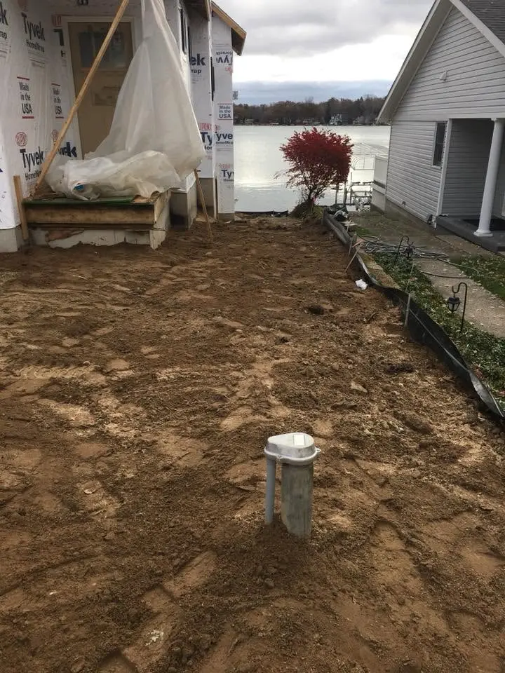 A completed wellhead, capped and finished above grade.