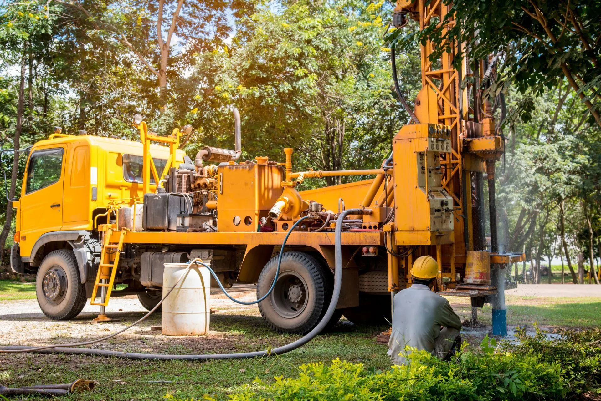 Truck-mounted Wahlfield Drilling rig set up to test a well on site